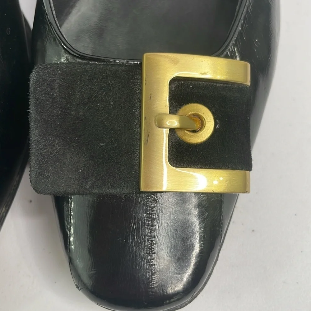 Vaneli black eel skin? Pumps w rounded square toe. Suede and gold buckle detail.